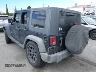 2007 Jeep Wrangler Unlimited X with VIN 1J4GB391X7L172965, listed as a IAAI auction lot 42040337 with 170,482 mi miles and . Bid and sale history available at DreamBid. Image 3.