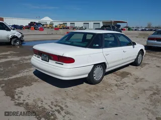 1995 Mercury Sable GS with VIN 1MELM50U1SA631336, listed as a IAAI auction lot 41629505 with 178,550 mi miles. Bid and sale history available at carsss.com. Image 4.