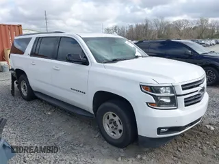 2019 Chevrolet Suburban LT with VIN 1GNSCHKC8KR405969, listed as a IAAI auction lot 41532271 with 107,003 mi miles and . Bid and sale history available at DreamBid. Image 1.
