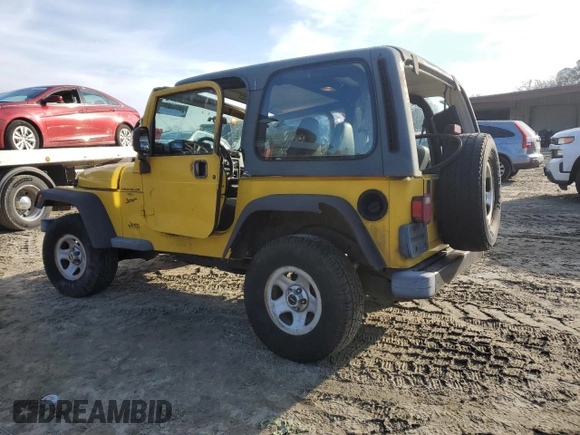 2001 Jeep Wrangler Sport with VIN 1J4FA49S21P312522, listed as a Copart auction lot 54698935 with 201,199 mi miles and Salvage Title. Bid and sale history available at carsss.com. Image 2.