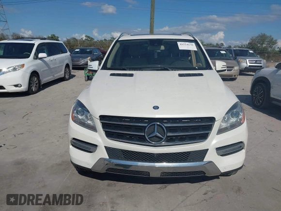 2014 Mercedes-Benz M 350 with VIN 4JGDA5HBXEA373643, listed as a IAAI auction lot 41554130 with 121,995 mi miles and . Bid and sale history available at DreamBid. Image 12.