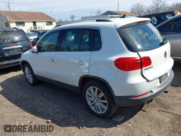 2012 Volkswagen Tiguan S with VIN WVGBV7AX0CW582922, listed as a IAAI auction lot 41906974 with 150,681 mi miles and . Bid and sale history available at DreamBid. Image 3.