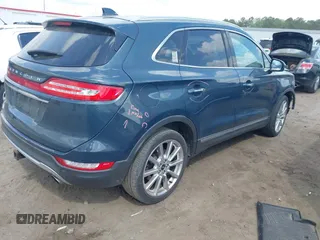 2019 Lincoln MKC Reserve with VIN 5LMCJ3C94KUL22859, listed as a IAAI auction lot 41963707 with 123,299 mi miles and . Bid and sale history available at DreamBid. Image 4.