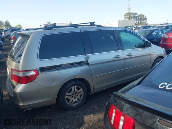 2005 Honda Odyssey EX-L with VIN 5FNRL38635B415153, listed as a IAAI auction lot 41912526 with 211,445 mi miles. Bid and sale history available at carsss.com. Image 4.