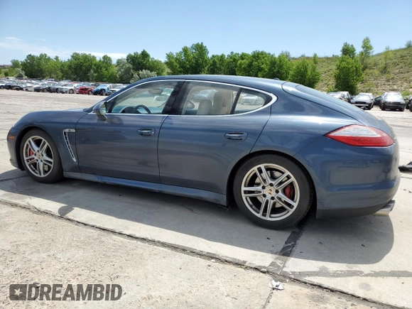 2010 Porsche Panamera Turbo with VIN WP0AC2A70AL090897, listed as a Copart auction lot 60986335 with 120,334 mi miles and Salvage title. Bid and sale history available at DreamBid. Image 2.