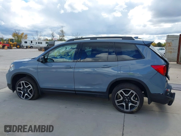 2023 Honda Passport Elite with VIN 5FNYF8H03PB000039, listed as a IAAI auction lot 40593339 with 33,697 mi miles and . Bid and sale history available at DreamBid. Image 14.