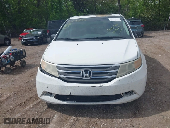 2012 Honda Odyssey EX-L with VIN 5FNRL5H63CB117341, listed as a IAAI auction lot 42197815 with 256,544 mi miles and . Bid and sale history available at DreamBid. Image 12.