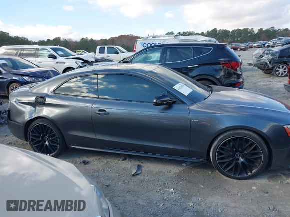 2016 Audi A5 Premium Plus with VIN WAUM2AFR7GA007018, listed as a IAAI auction lot 41023854 with 130,311 mi miles. Bid and sale history available at carsss.com. Image 13.