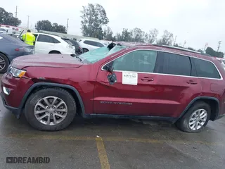 2021 Jeep Grand Cherokee Laredo X with VIN 1C4RJEAG4MC681989, listed as a IAAI auction lot 41571341 with 61,090 mi miles. Bid and sale history available at carsss.com. Image 14.