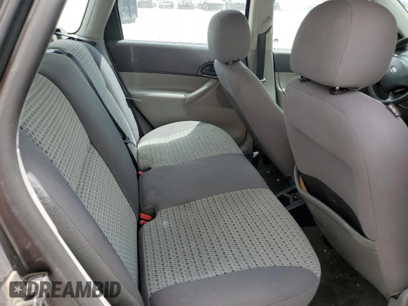 2006 Ford Focus SE with VIN 1FAHP36N56W223049, listed as a Copart auction lot 61211745 with 185,609 mi miles and Salvage title. Bid and sale history available at DreamBid. Image 10.