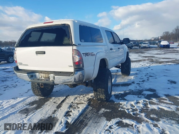 2014 Toyota Tacoma with VIN 3TMLU4EN0EM147193, listed as a IAAI auction lot 41280636 with 162,345 mi miles. Bid and sale history available at carsss.com. Image 4.