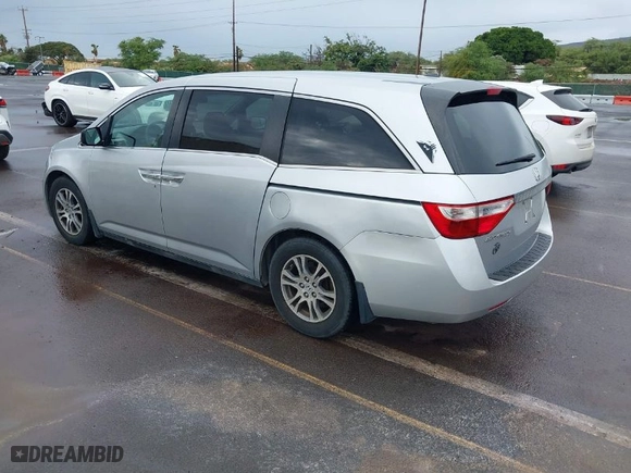 2012 Honda Odyssey EX-L with VIN 5FNRL5H68CB056567, listed as a IAAI auction lot 41014382 with 101,885 mi miles. Bid and sale history available at carsss.com. Image 3.