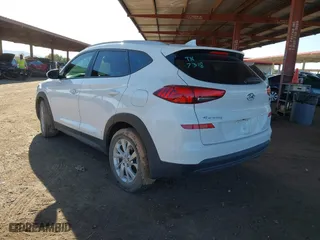 2019 Hyundai Tucson Value with VIN KM8J33A49KU979927, listed as a IAAI auction lot 41818355 with 96,208 mi miles. Bid and sale history available at carsss.com. Image 3.