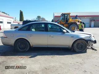 2008 Ford Taurus SEL z VIN 1FAHP24WX8G132507, wystawiony jako IAAI lot #42013031 z przebiegiem 110 805 mil mil oraz . Historia ofert i sprzedaży dostępna na DreamBid. Obrazek 12.