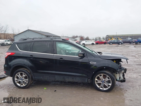2013 Ford Escape SEL with VIN 1FMCU9H90DUA77972, listed as a IAAI auction lot 41984889 with 206,265 mi miles. Bid and sale history available at carsss.com. Image 13.