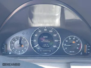 2003 Mercedes-Benz CLK-Class 5.0L with VIN WDBTJ75J03F059702, listed as a IAAI auction lot 41687017 with 185,854 mi miles. Bid and sale history available at carsss.com. Image 15.