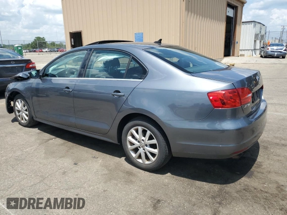 2013 Volkswagen Jetta SE with VIN 3VWDP7AJ8DM449097, listed as a Copart auction lot 62155135 with 130,266 mi miles and Salvage title. Bid and sale history available at DreamBid. Image 2.