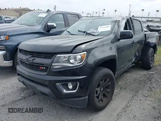 2019 Chevrolet Colorado 4WD Z71 with VIN 1GCGTDEN5K1289956, listed as a IAAI auction lot 41729406 with 60,887 mi miles. Bid and sale history available at carsss.com. Image 2.