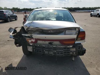 2002 Saturn SL with VIN 1G8ZK52752Z190850, listed as a Copart auction lot 61399245 with 200,085 mi miles and Salvage title. Bid and sale history available at DreamBid. Image 6.