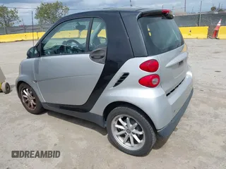 2008 Smart fortwo Pure z VIN WMEEJ31X18K191722, wystawiony jako IAAI lot #42138617 z przebiegiem 117 263 mil mil oraz . Historia ofert i sprzedaży dostępna na DreamBid. Obrazek 3.