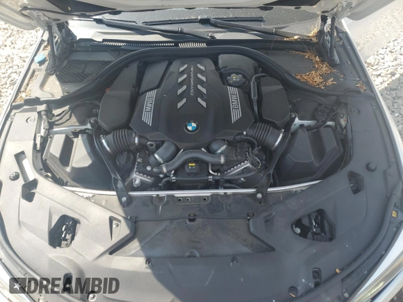 2020 BMW 8 Series M850i z VIN WBAGV8C06LBP48932, wystawiony jako Copart lot #57165015 z przebiegiem 55 731 mil mil oraz Szkoda całkowita • Salvage title. Historia ofert i sprzedaży dostępna na DreamBid. Obrazek 11.