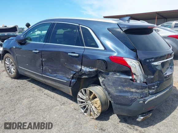 2019 Cadillac XT5 Luxury AWD z VIN 1GYKNDRSXKZ232989, wystawiony jako IAAI lot #42331092 z przebiegiem 54 100 mil mil oraz . Historia ofert i sprzedaży dostępna na DreamBid. Obrazek 3.