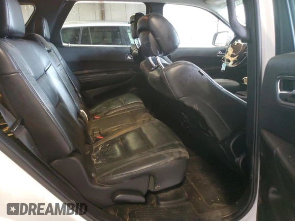 2014 Dodge Durango Limited z VIN 1C4RDJDG1EC593074, wystawiony jako Copart lot #64185525 z przebiegiem 125 203 mil mil oraz Szkoda całkowita • Salvage title. Historia ofert i sprzedaży dostępna na DreamBid. Obrazek 11.