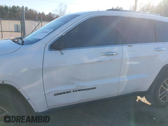 2017 Jeep Grand Cherokee Limited with VIN 1C4RJEBG8HC887899, listed as a IAAI auction lot 41242803 with 96,574 mi miles and . Bid and sale history available at DreamBid. Image 17.