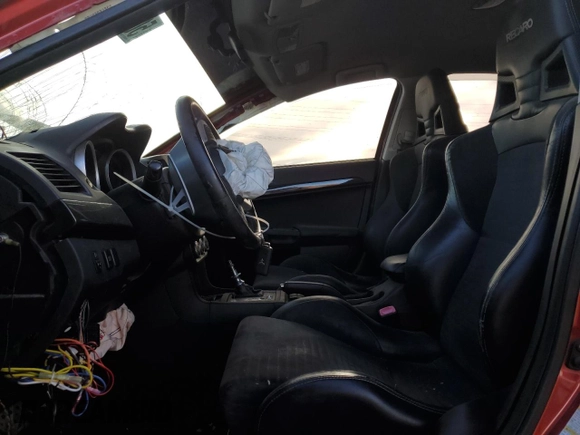 2008 Mitsubishi Lancer Evolution MR z VIN JA3AW56V98U051308, wystawiony jako Copart lot #50452355 z przebiegiem Nie podano mil oraz Szkoda całkowita • Salvage title. Historia ofert i sprzedaży dostępna na DreamBid. Obrazek 7.