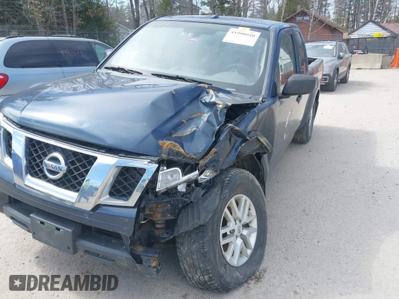 2015 Nissan Frontier SV with VIN 1N6AD0CW5FN758076, listed as a IAAI auction lot 41990940 with 141,517 mi miles and . Bid and sale history available at DreamBid. Image 6.