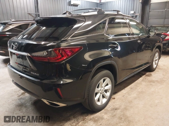 2016 Lexus RX 350 with VIN 2T2BZMCAXGC052189, listed as a IAAI auction lot 42568720 with 65,889 mi miles and . Bid and sale history available at DreamBid. Image 4.