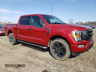 2022 Ford F-150 XL with VIN 1FTEW1EP3NFA79541, listed as a Copart auction lot 49204215 with 54,992 mi miles and Salvage Title. Bid and sale history available at DreamBid. Image 4.