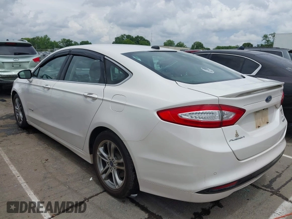 2016 Ford Fusion Titanium Hybrid with VIN 3FA6P0RU3GR190355, listed as a IAAI auction lot 42384309 with 157,172 mi miles and . Bid and sale history available at DreamBid. Image 3.