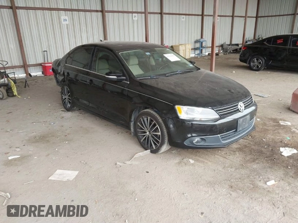 2012 Volkswagen Jetta Sedan SEL w/Sunroof with VIN 3VWLX7AJ5CM379634, listed as a IAAI auction lot 41634048 with 209,586 mi miles. Bid and sale history available at carsss.com. Image 1.