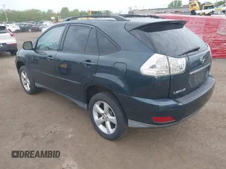 2006 Lexus RX 330 with VIN 2T2HA31U56C090677, listed as a IAAI auction lot 42182540 with 216,676 mi miles. Bid and sale history available at carsss.com. Image 3.
