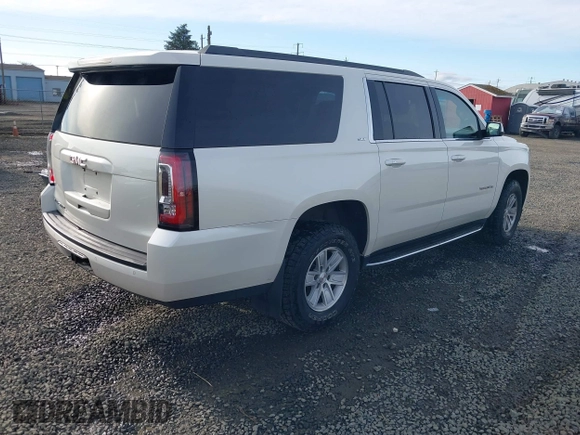 2015 GMC Yukon XL SLT with VIN 1GKS2HKC3FR586338, listed as a IAAI auction lot 41632662 with 149,133 mi miles. Bid and sale history available at carsss.com. Image 4.