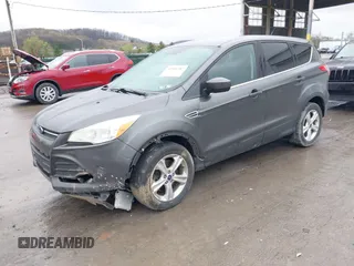 2015 Ford Escape SE with VIN 1FMCU9GX6FUC73272, listed as a IAAI auction lot 41966307 with 118,144 mi miles and . Bid and sale history available at DreamBid. Image 2.