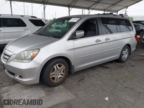 2007 Honda Odyssey EX with VIN 5FNRL38477B432832, listed as a IAAI auction lot 42153673 with 133,652 mi miles and . Bid and sale history available at DreamBid. Image 2.