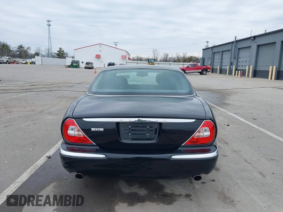 2004 Jaguar XJ with VIN SAJWA71C14SG20122, listed as a IAAI auction lot 41685767 with 113,392 mi miles. Bid and sale history available at carsss.com. Image 17.