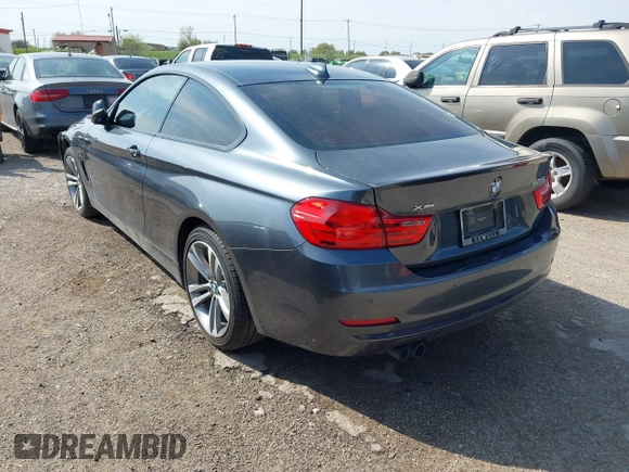2015 BMW 4 Series 428i xDrive z VIN WBA3N5C55FK484938, wystawiony jako IAAI lot #41889907 z przebiegiem 100 439 mil mil oraz . Historia ofert i sprzedaży dostępna na DreamBid. Obrazek 3.