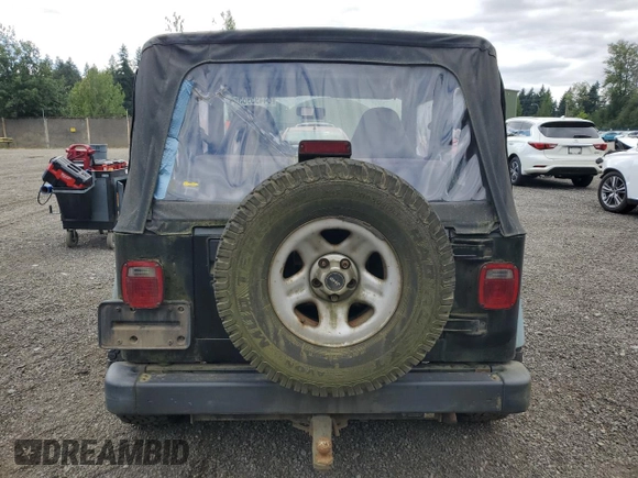 1998 Jeep Wrangler Sport z VIN 1J4FY19S7WP801709, wystawiony jako Copart lot #64495985 z przebiegiem 260 798 mil mil oraz Czysty tytuł • Clean title. Historia ofert i sprzedaży dostępna na DreamBid. Obrazek 6.