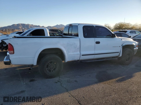 1998 Dodge Dakota SLT with VIN 1B7GG22Y1WS544271, listed as a Copart auction lot 88781885 with 149,417 mi miles and Salvage Title. Bid and sale history available at carsss.com. Image 3.