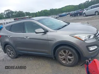 2016 Hyundai Santa Fe z VIN 5XYZU3LB1GG358111, wystawiony jako IAAI lot #42377494 z przebiegiem 92 745 mil mil oraz . Historia ofert i sprzedaży dostępna na DreamBid. Obrazek 13.