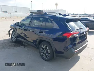 2024 Toyota RAV4 Hybrid XLE Premium with VIN 4T3B6RFV6RU146619, listed as a IAAI auction lot 42060476 with 22,594 mi miles and . Bid and sale history available at DreamBid. Image 3.
