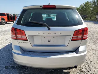 2013 Dodge Journey American Value with VIN 3C4PDCAB1DT715799, listed as a Copart auction lot 52404815 with 185,559 mi miles and Salvage Title. Bid and sale history available at DreamBid. Image 6.