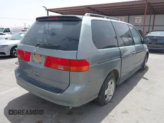 2000 Honda Odyssey EX z VIN 2HKRL1865YH569356, wystawiony jako IAAI lot #42257861 z przebiegiem Nie podano mil oraz . Historia ofert i sprzedaży dostępna na DreamBid. Obrazek 4.