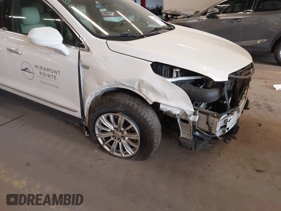 2017 Cadillac XT5 FWD with VIN 1GYKNARS7HZ121596, listed as a IAAI auction lot 41825879 with 82,023 mi miles and . Bid and sale history available at DreamBid. Image 18.