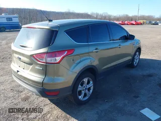 2013 Ford Escape SE with VIN 1FMCU0GX1DUA41932, listed as a IAAI auction lot 41896200 with 190,545 mi miles. Bid and sale history available at carsss.com. Image 4.