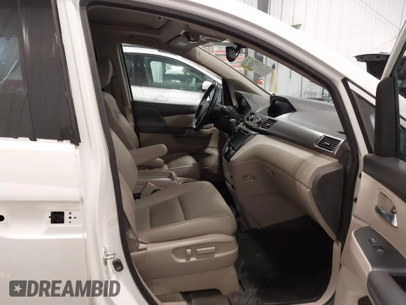 2015 Honda Odyssey Touring Elite with VIN 5FNRL5H92FB020159, listed as a IAAI auction lot 42103240 with 79,322 mi miles and . Bid and sale history available at DreamBid. Image 5.