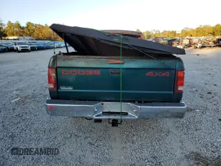 1996 Dodge Dakota z VIN 1B7GG23X4TS568274, wystawiony jako Copart lot #75719914 z przebiegiem Nie podano mil oraz Nie do naprawy • Non repairable. Historia ofert i sprzedaży dostępna na DreamBid. Obrazek 6.